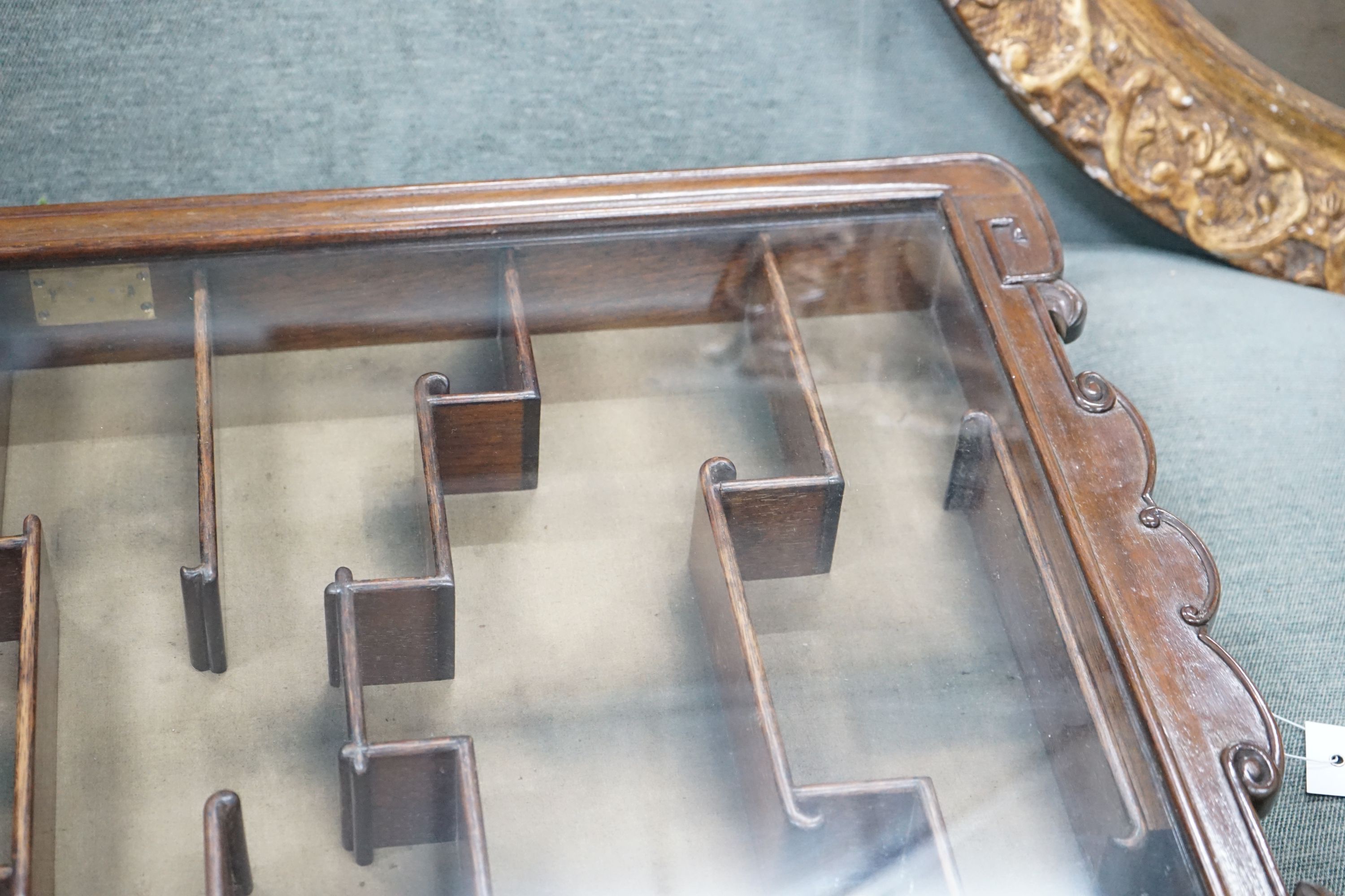 A Chinese glazed hardwood hanging display cabinet, width 52cm, height 85cm